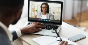 Man on a video call with a financial advisor