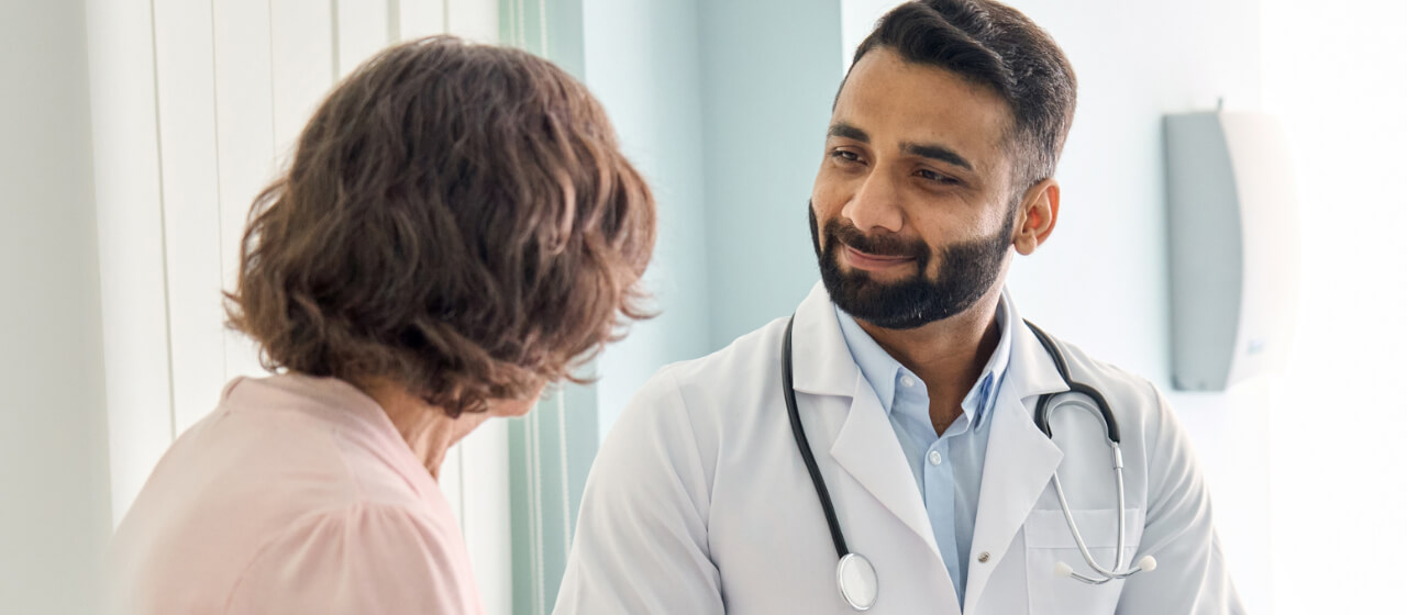 Doctor talking to patient